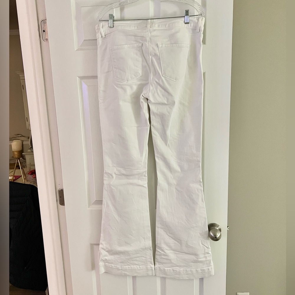 White flare legged J Brand jeans